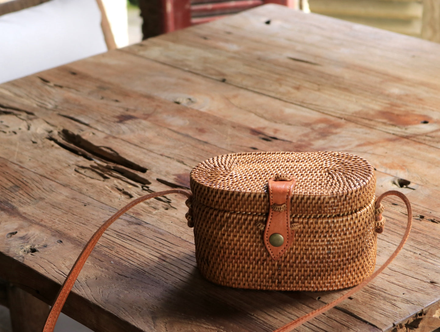 Mini Oval Ata Crossbody Bag with Snap Closure – Handwoven in Bali